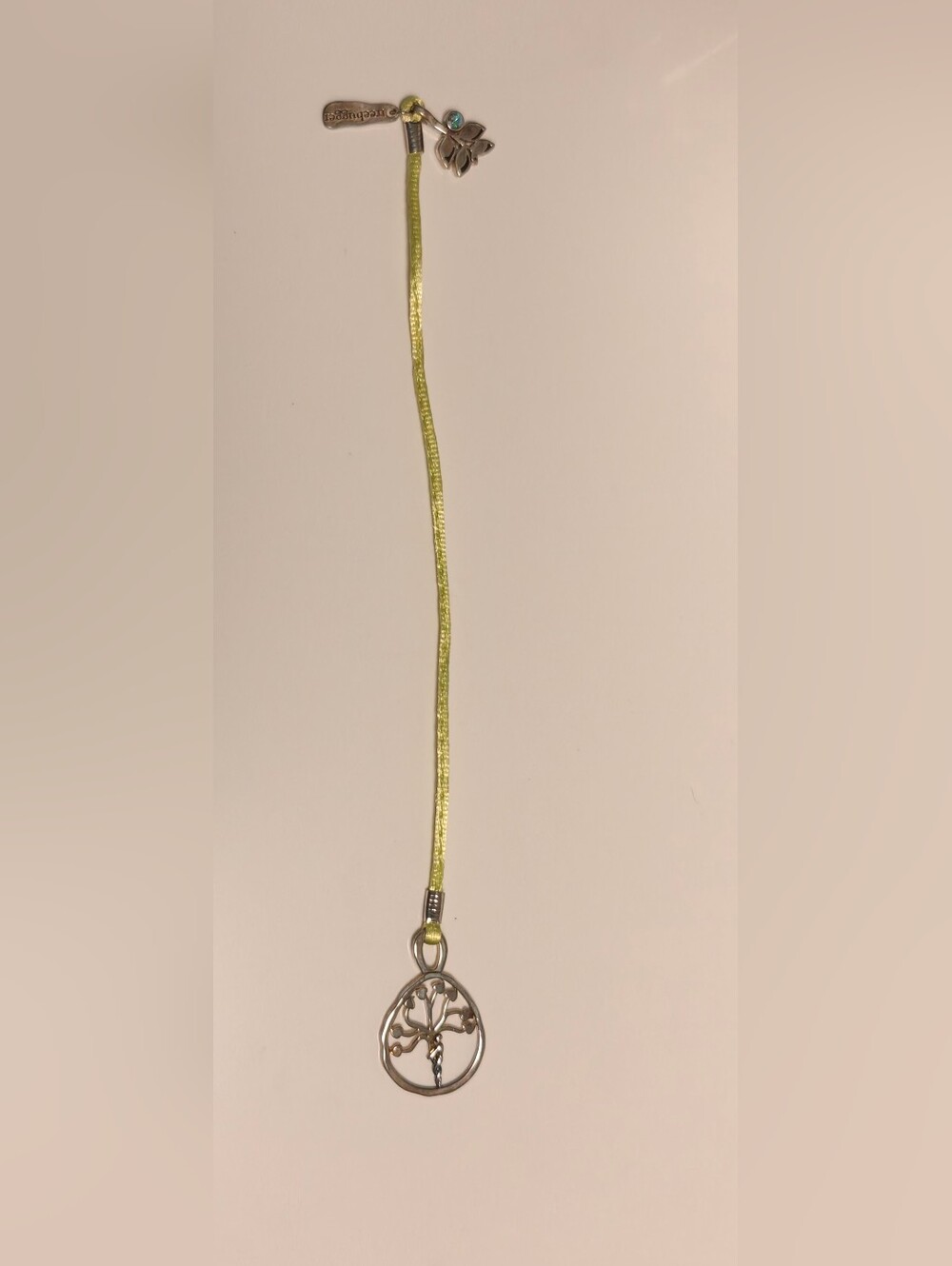 Silver Tree Hugger bookmark features a charm pendant on a lime green ribbon